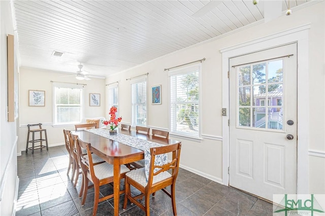 dining space with a wealth of natural light, ceiling fan, and ornamental molding