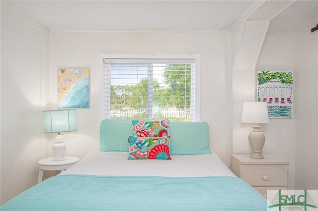 bedroom featuring ornamental molding