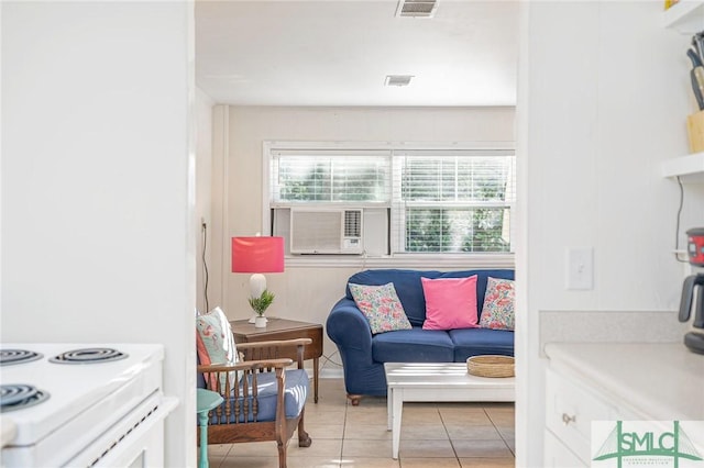 sitting room featuring light tile patterned floors