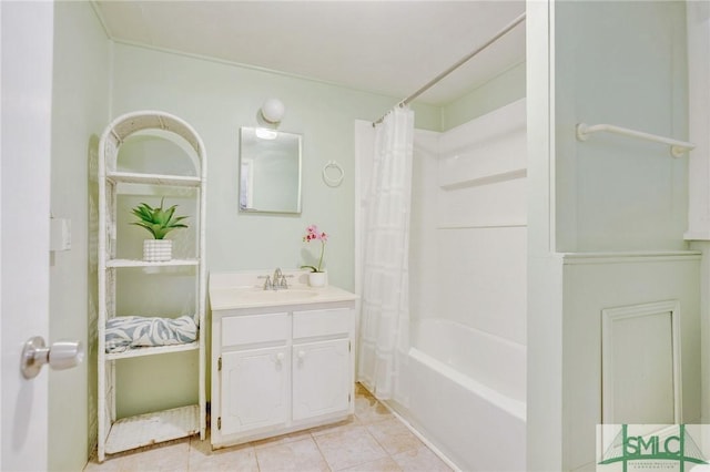 bathroom featuring tile patterned floors, vanity, and shower / bath combo