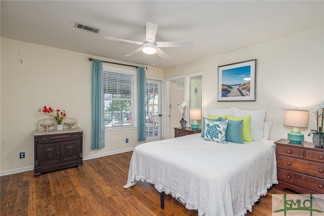 bedroom featuring ceiling fan and dark wood-type flooring