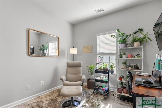 living area featuring hardwood / wood-style flooring