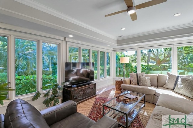 sunroom / solarium with ceiling fan