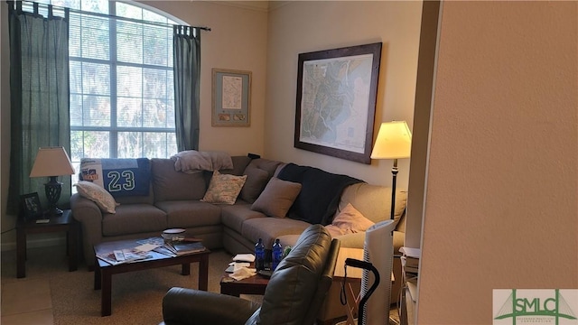 living room with tile patterned flooring