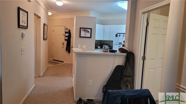 corridor featuring light colored carpet and crown molding