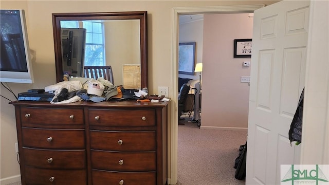 hallway featuring carpet floors