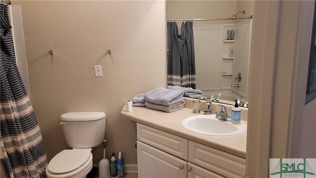 full bathroom with vanity, toilet, and shower / tub combo with curtain