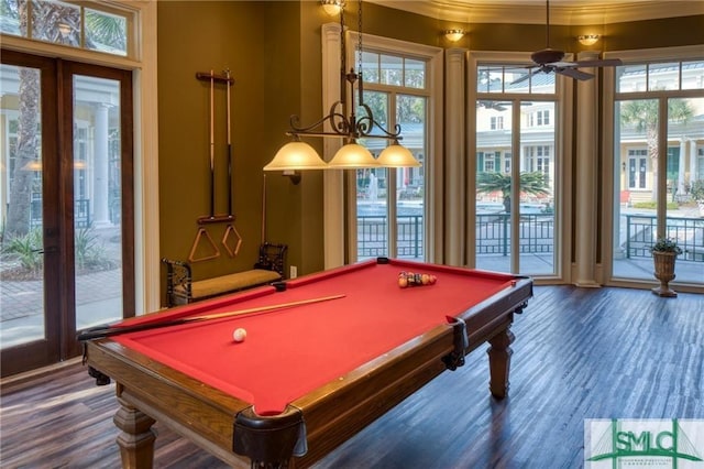 rec room with ceiling fan, french doors, dark wood-type flooring, crown molding, and pool table