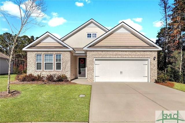 view of front of home with a front lawn and a garage