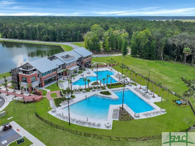 birds eye view of property featuring a water view