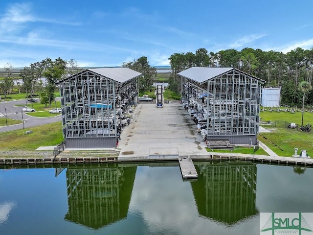 exterior space with a water view