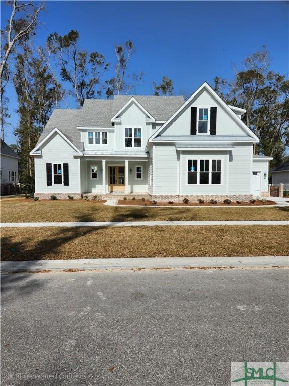 modern inspired farmhouse with roof with shingles and a front lawn