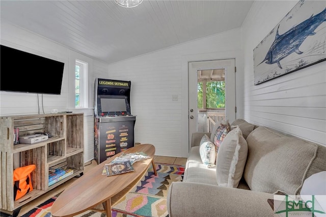 living room featuring hardwood / wood-style floors, wood ceiling, and vaulted ceiling