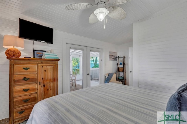 bedroom with french doors, access to outside, and ceiling fan