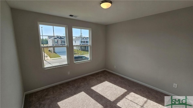 view of carpeted spare room