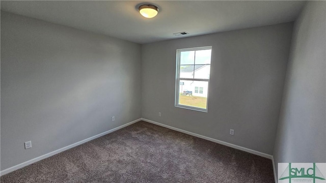 unfurnished room with carpet