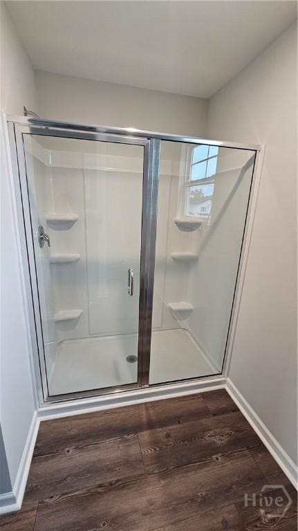 150 Cross Creek Dr, Pooler, GA 31322 - bathroom featuring a shower stall, wood finished floors, and baseboards