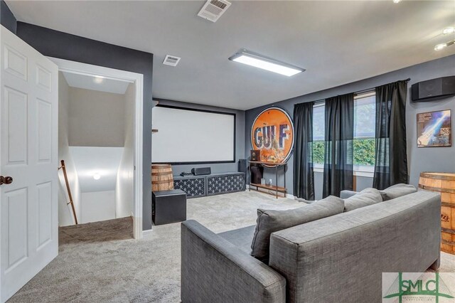 home theater with carpet and visible vents