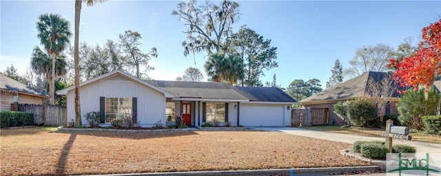 single story home featuring a garage