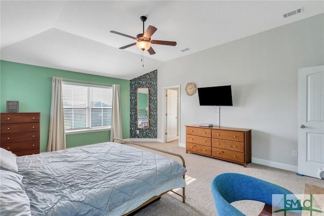 carpeted bedroom featuring ceiling fan and vaulted ceiling