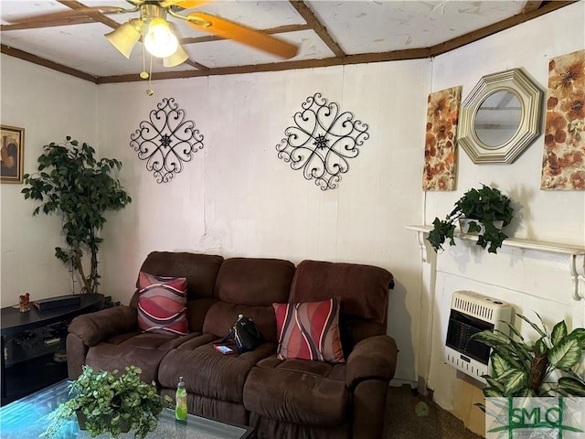 living room featuring carpet, ceiling fan, and heating unit