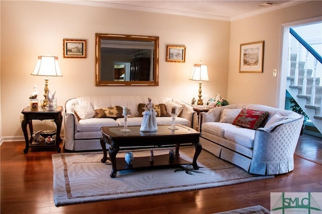 living room featuring ornamental molding and dark wood-type flooring