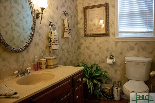 bathroom with vanity and toilet