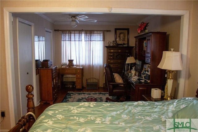 bedroom with crown molding