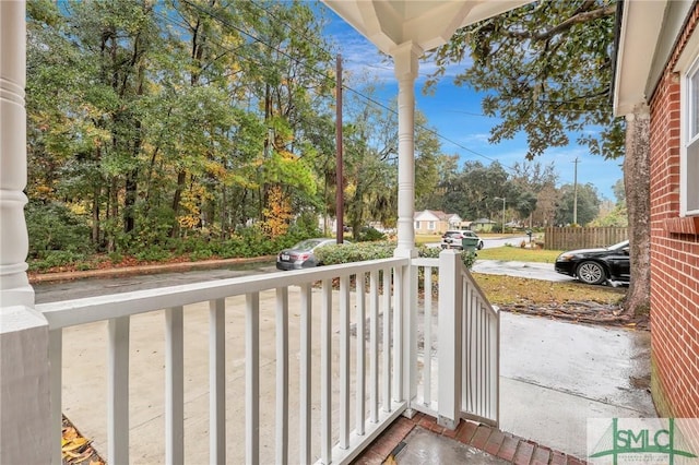 balcony featuring covered porch