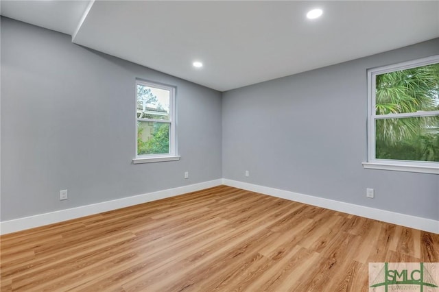 empty room featuring light hardwood / wood-style floors