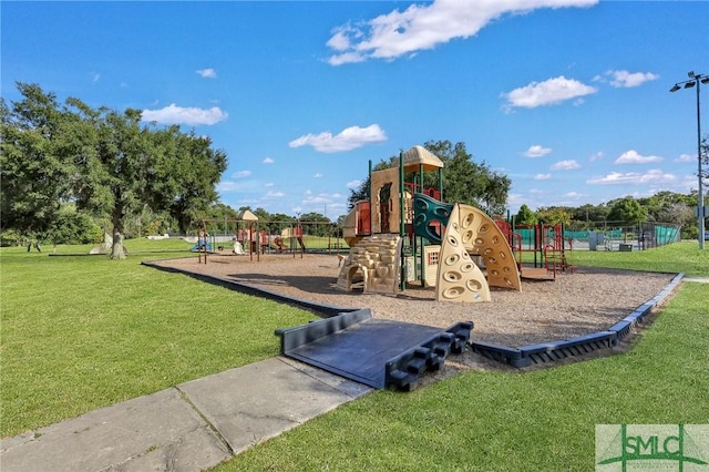 view of playground featuring a lawn