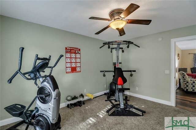 exercise room with carpet and ceiling fan