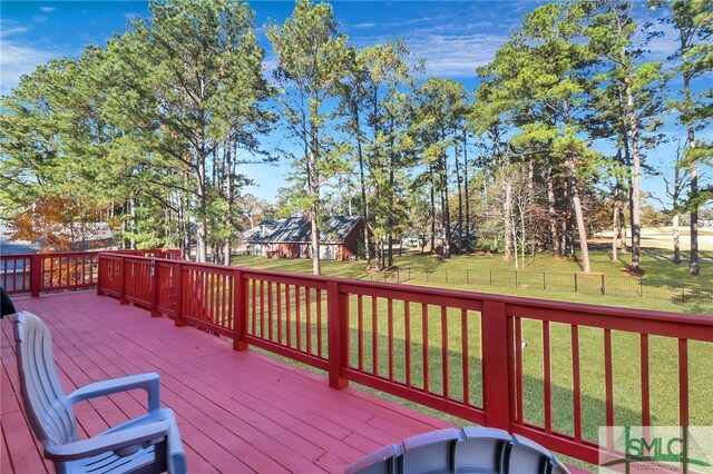 deck featuring a yard