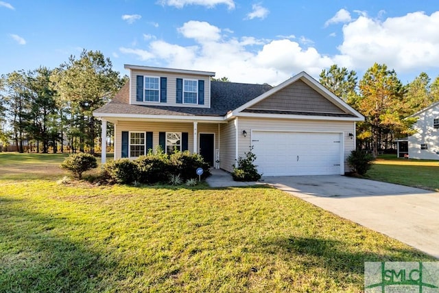 view of front of house featuring a garage and a front yard