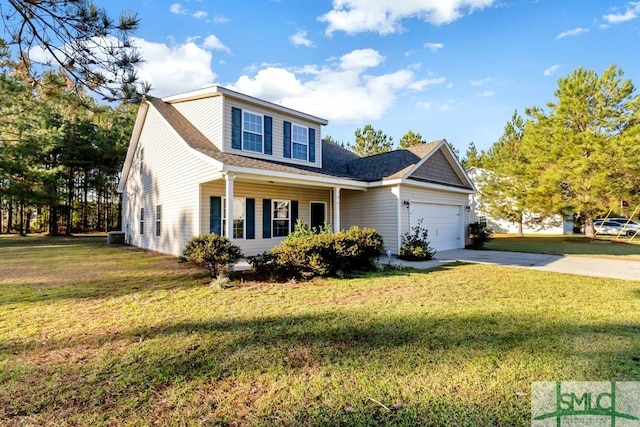 view of front facade with a garage and a front lawn