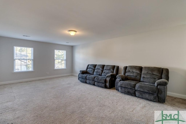 living room featuring light carpet