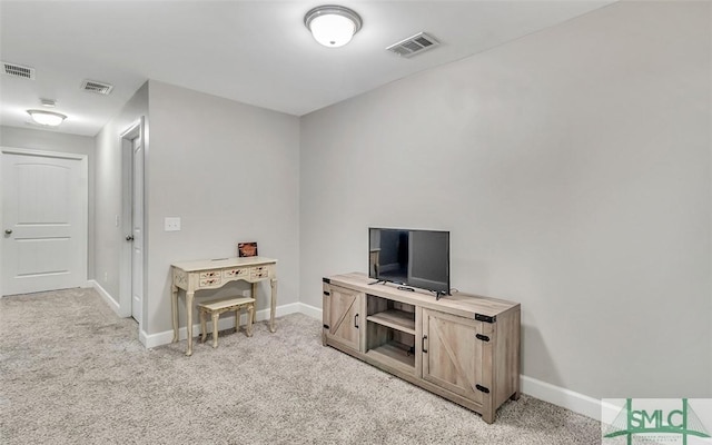 office space with light colored carpet