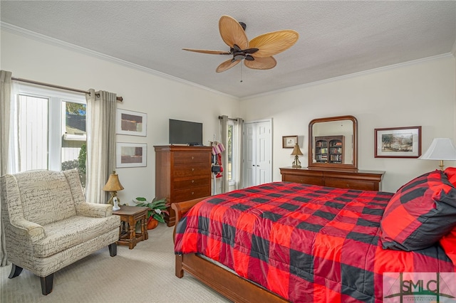 bedroom with light carpet, a textured ceiling, ceiling fan, and ornamental molding