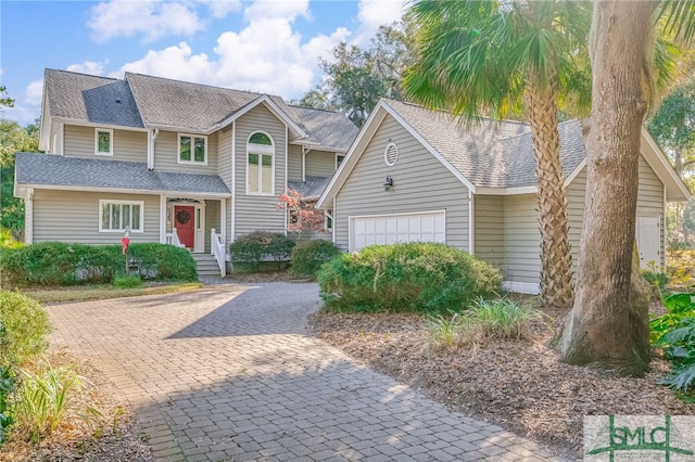 view of front of property with a garage