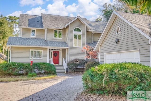 view of front of property featuring a garage