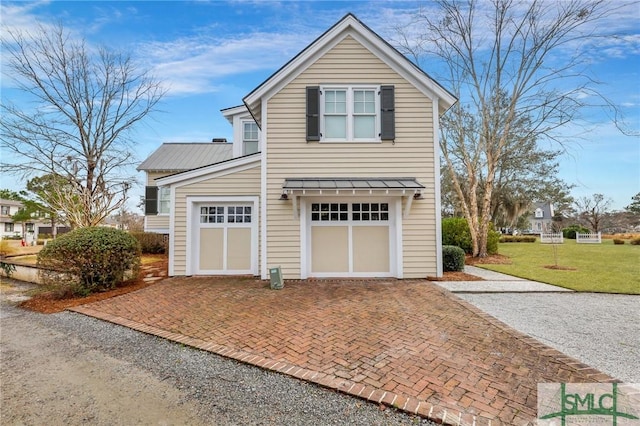 garage with a lawn