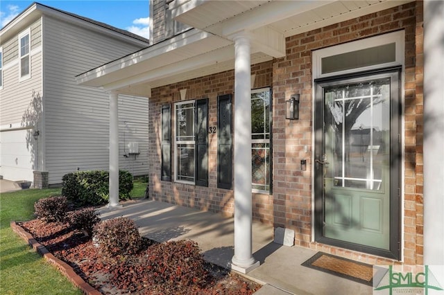 doorway to property featuring a porch