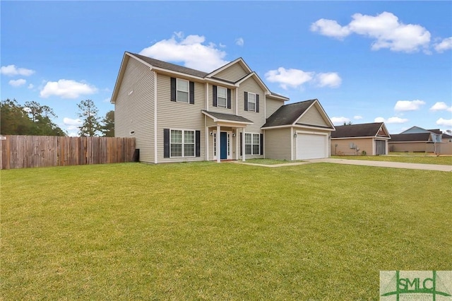 view of front of property with a garage and a front lawn