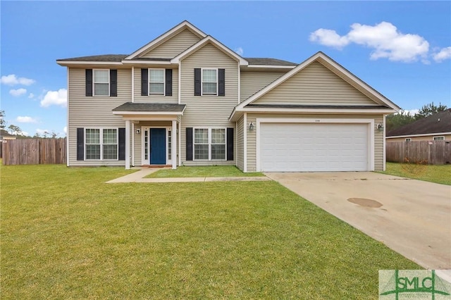 view of front facade with a garage and a front yard