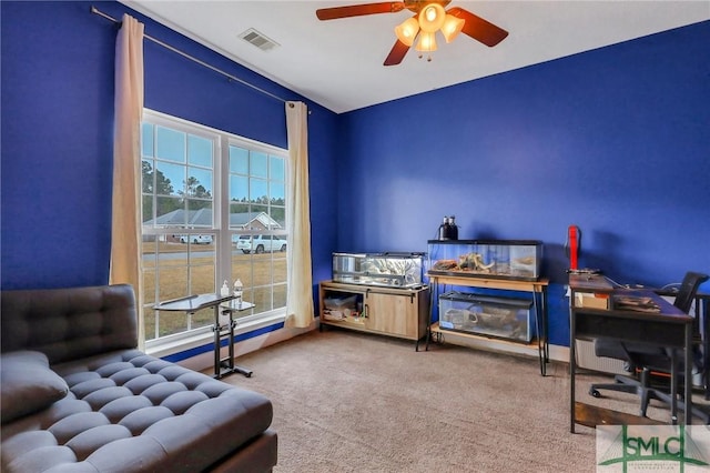 office featuring carpet flooring and ceiling fan