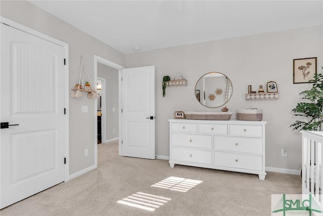 unfurnished bedroom featuring light carpet