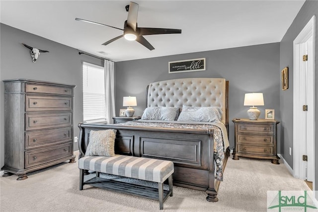 carpeted bedroom with ceiling fan