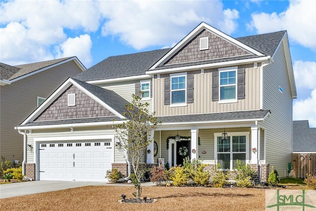 craftsman house with a garage