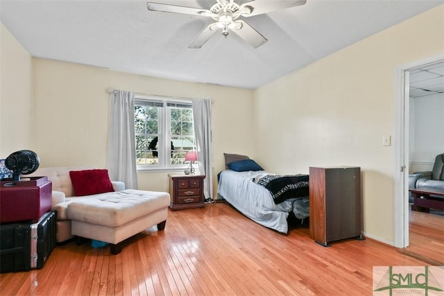 bedroom featuring light hardwood / wood-style flooring and ceiling fan