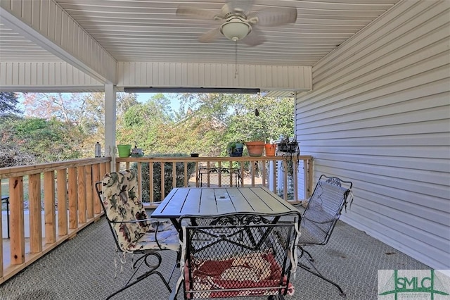 wooden deck with ceiling fan